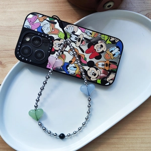 Disney cartoon iPhone case with colorful heart beaded strap on a white tray