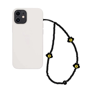 Coque de téléphone blanc mat avec dragonne en perles noires et œil de monstre