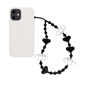 Beaded phone strap with black hearts and white clouds on minimalist phone case