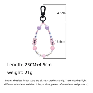Detail showing dimensions of the cute beaded bear keychain with 23cm total length