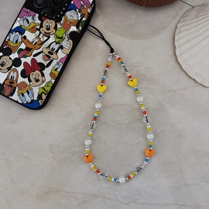 Handmade colorful heart beaded phone charm with pearls and vibrant multi-colored accents