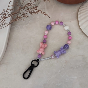 Pink and purple beaded keychain featuring cute resin bears and black metal clasp