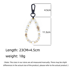 Handmade Snow White faux pearl keychain charm with gold beads and crystal accents