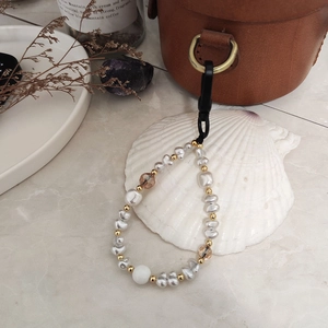 Handmade Snow White pearl and crystal bead keychain charm with gold accents and clasp