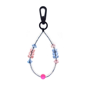 Porte-clés en perles avec ours et étoile en acrylique et fermoir mousqueton noir robuste