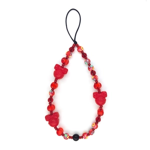 Chinese red beaded phone strap with Minnie-style charms and crystals for festive look