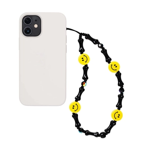 Y2K style beaded phone strap with black bone beads and yellow smiley face charms
