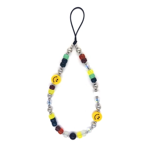 Colorful beaded phone strap with yellow smiley face and assorted glass beads on white base