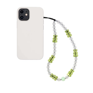 Detailed close-up of a frosted bead phone strap with a green resin gummy bear charm