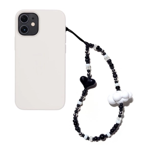 Minimalist black and white beaded phone charm with acrylic heart and cloud pendants