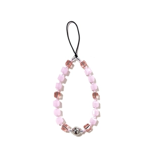 Detail of pink crystal cube beads and silver metal ball on a beaded phone charm strap