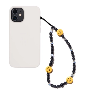 White silicone phone case with colorful smiley face beaded charm lanyard strap