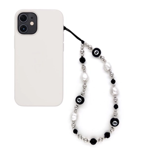 Beaded phone lanyard with billiard 8-ball charm and faux pearls on white case