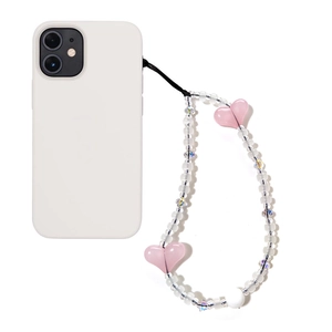 Handmade beaded phone strap with pink heart charm and aurora beads on white case