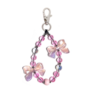 Sweet pink beaded phone charm with crystal bows and silver lobster clasp for women