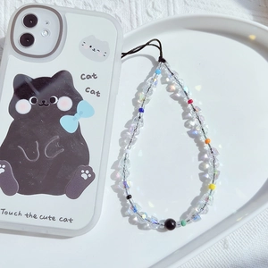 Detail of colorful faceted crystal beads phone strap with cute cat pattern phone case