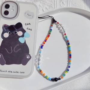 Handmade colorful beaded phone strap on a cute white cat theme protective case