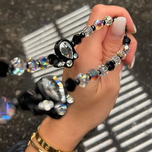 Beaded crystal phone strap with black heart pendant and sparkling AB coated beads