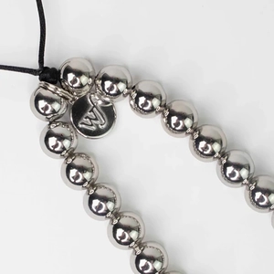 Silver beaded heart phone strap with metal 'W' pendant and black braided cord