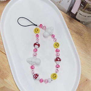 Pink mushroom and smiley face beaded phone charm with white clouds and colored beads