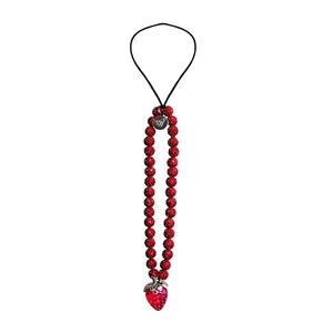 Sparkly red beaded phone charm strap with translucent strawberry pendant and silver accents
