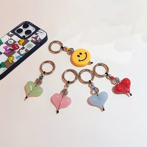 Acrylic heart and smiley face keychains with colorful beads for bags and keys