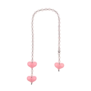 Close-up of handmade pink acrylic beaded charm with silver metal beads and heart pendants
