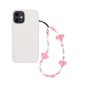 Handmade beaded phone strap with pink hearts and cream pearls on white background