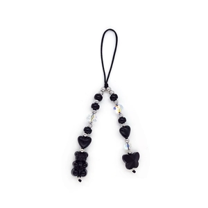 Detail of Y2K style beaded phone strap with black hearts and silver bear charms
