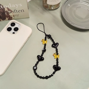 Creative beaded phone strap with yellow duck, black heart and billiard ball charms