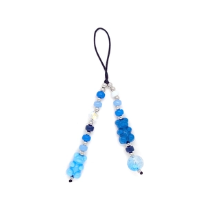 Detail of blue beaded charm with matte and translucent bears for bags and phones