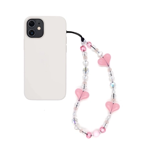 Handmade beaded phone strap with pink acrylic hearts and clear crystals on white case