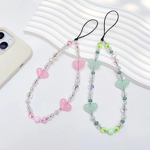 Handmade beaded phone charms with acrylic heart beads and pearls in pink and green colors