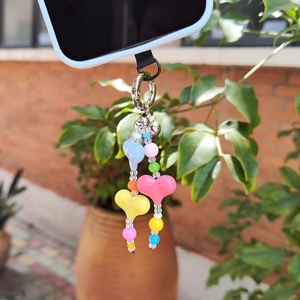 Colorful candy-style heart beaded phone strap with vibrant acrylic beads and metal ring