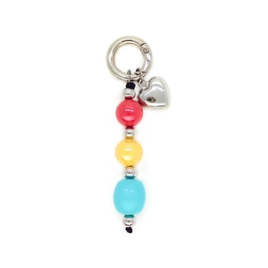 Colorful beaded keychain with red, yellow, and blue beads and a silver heart pendant