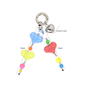Detail showing dimensions of colorful beaded heart phone strap with silver spring clasp