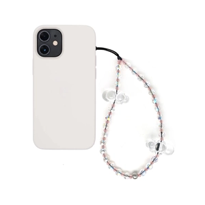 Close-up of handmade acrylic cloud phone charm with gradient beads and faceted crystals