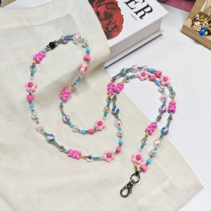 Pink bear party beaded phone strap with pearls and heart charms for cross-body use