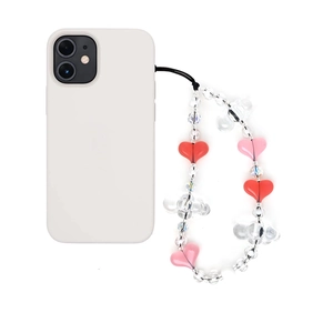 Chic beaded phone wrist strap with red and pink hearts on a white case