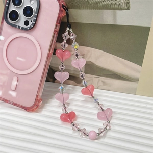 Sweet pink heart beaded phone strap with clear crystals on a pink MagSafe case