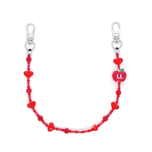 Beaded phone lanyard featuring red heart beads and a cute apple charm with silver clasps