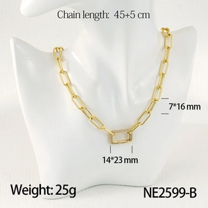 Detailed view of golden paperclip chain necklace with zircon pendant and dimensions