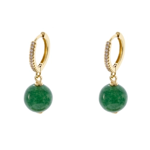 Macro shot of gold hoop earrings with micro-set zircons and green quartz stone beads