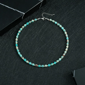 Lapis lazuli style beaded necklace with square blue stones and silver spacer beads