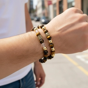 Men's crown bead bracelet set with tiger eye stones and gold cubic zirconia cubic charms