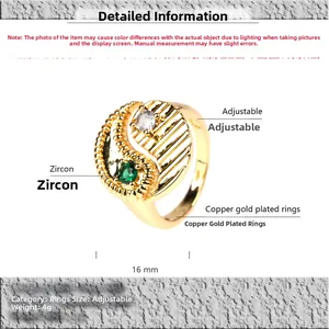 Detail view of gold-plated copper Yin Yang ring with green and white cubic zirconia