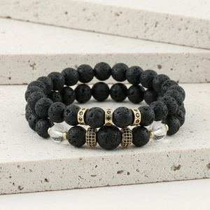 Detail of beaded lava stone bracelets with micro-p鑲 black zircon and gold accents