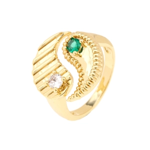 Detail of gold-plated Yin Yang ring featuring emerald green stone and white zircon