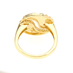Macro detail of gold plated wavy ring showing intricate inner texture and polished finish