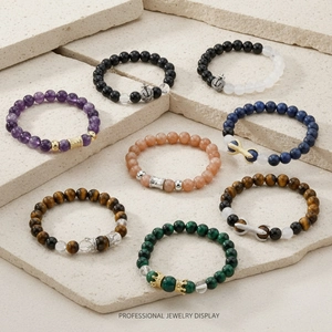 Set of 8 natural stone beaded bracelets with amethyst, lapis lazuli and metal charms